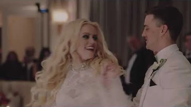 Tyler and Sheridan laughing together at their Austin Country Club reception